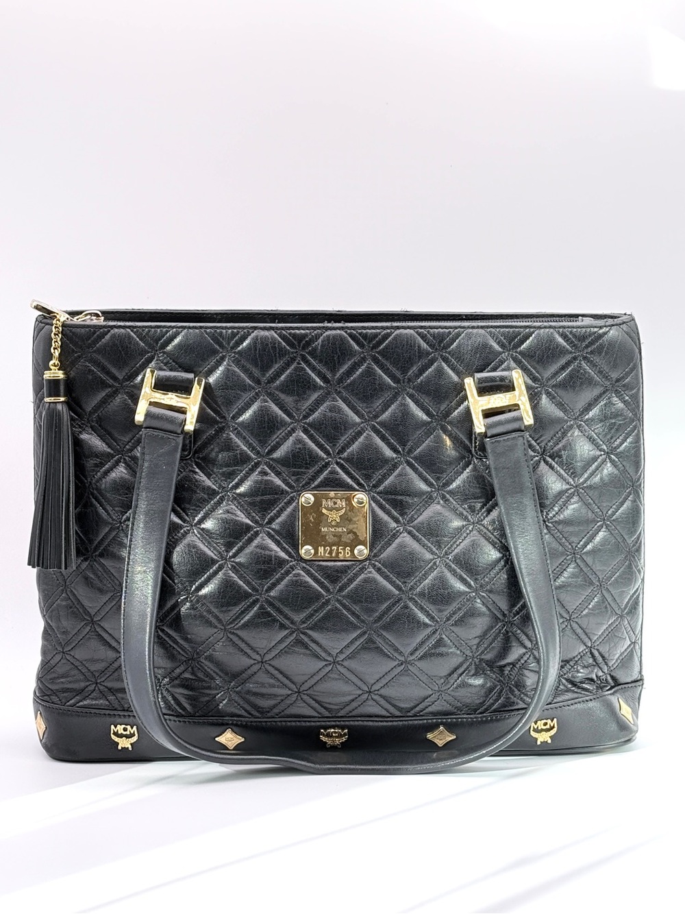 VINTAGE MCM BLACK QUILTED LEATHER GOLD-EMBELLISHED TOTE BAG